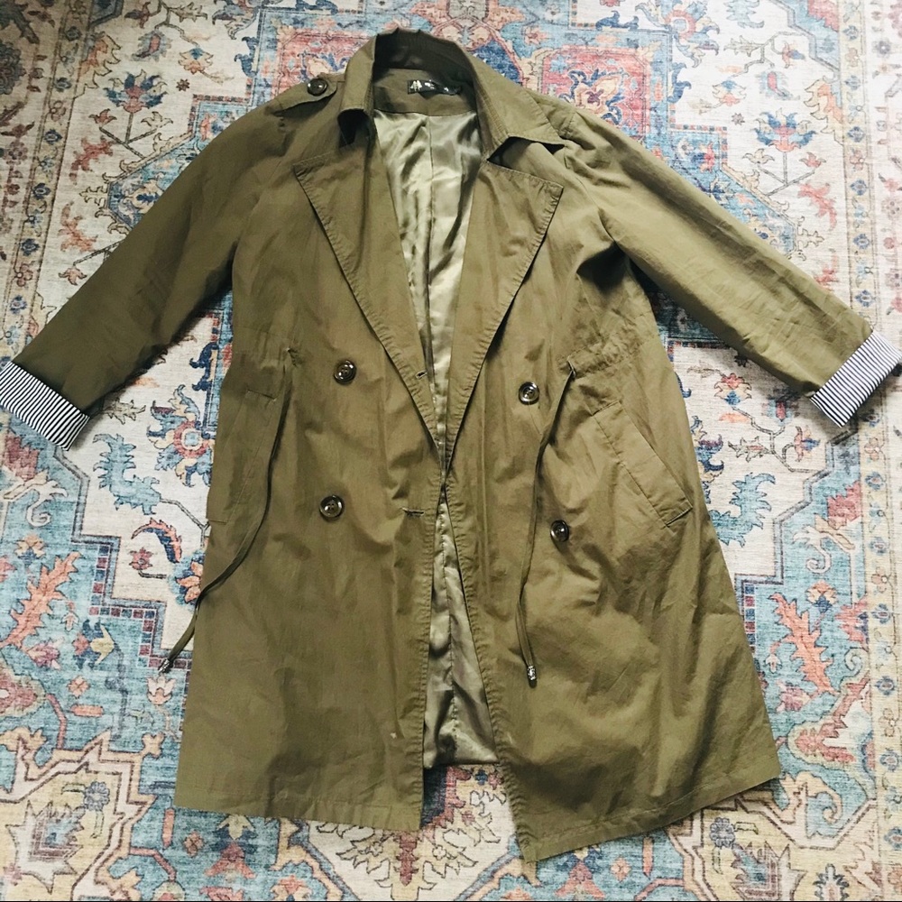 Oversized green trench with contrast cuffs
